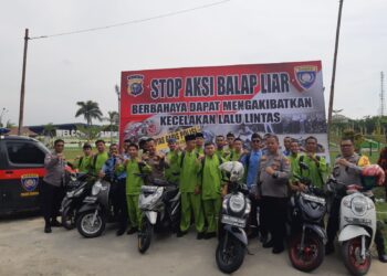 Polres Kampar Laksanakan Pemasangan Baliho Himbauan Bahaya Balap Liar