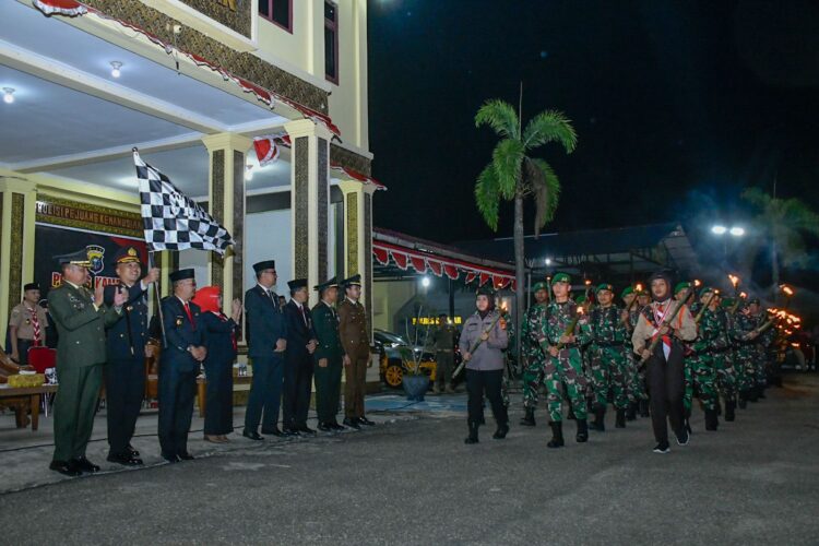Polres Kampar dan Forkopimda Gelar Upacara Taptu Di Halaman Mapolres Kampar