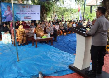 Kapolres Inhu Serahkan Bantuan Sumur Bor dan Pompa Air di Desa Rantau Mapesai