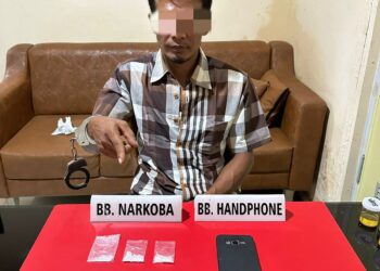 Satnarkoba Tangkap Pelaku Narkoba Sedang Duduk di Bawah Pohon Kelapa Sawit