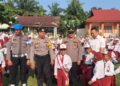 Mengharukan, Ini Yang Dilakukan Anak Buah Kapolda Riau Irjen Iqbal,Memberi Bantuan Sepatu untuk Anak Sekolah