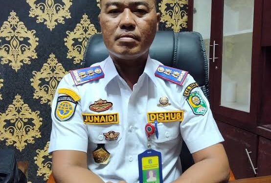 Kadishub Siak, Junaidi SE MM Lakukan Pembebasan Biaya Retrebusi Parkir