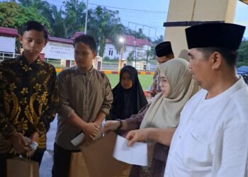 Polsek Pangean Gelar Buka Puasa Bersama dan Santunan Anak Yatim