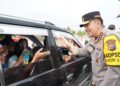 Jendra Bintang Dua, Turun Langsung Atur Lalu Lintas Arus Mudik di Tol Sungai Pinang Kampar
