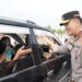 Jendra Bintang Dua, Turun Langsung Atur Lalu Lintas Arus Mudik di Tol Sungai Pinang Kampar