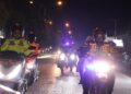 Kapolres Pelalawan di Dampingi Kasat Lantas Sambangi Pos Kambling Gunakan Sepeda Motor