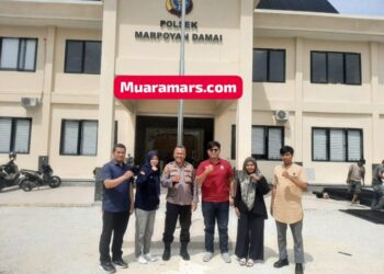 Anggota PPK Kecamatan Marpoyan Damai Silatirahmi Dengan Kapolsek Bukit Raya di Mapolsek Persiapan Marpoyan Damai   