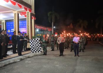 Polres Kampar dan Forkopimda Gelar Upacara Taptu Di Halaman Mapolres Kampar
