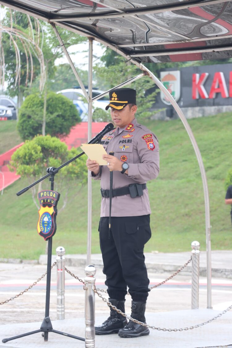 Polres Pelalawan Gelar Apel dan Peragaan silulasi Sispam Kota 2024
