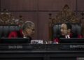 Ketua Majelis MK Memutuskan untuk Mencabut dan merevisi 21 pasal dari UU Ciptaker” ini Daftar 21 Pasal yang Diubah Dalam UU Cipta Kerja