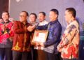 Pj Bupati Kampar H Hambali SE, MBA, MH Terima Penghargaan Sidhakarya Tahun 2024
