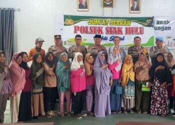 Polsek Siak Hulu Terus Berbagi Dalam Jumat Berkah
