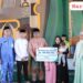 Plh Sekda Kota Pekanbaru, Zarman Chandra, Menyerahkan Bantuan Santunan Kematian Kepada Dua Pegawai