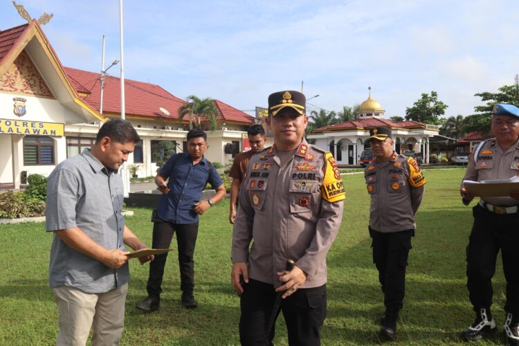 Kapolres Pelalawan Pimpin Apel Kesiap Siagaan Antisipasi Arus Balik H Ke-4 Idul Fitri 1446 H