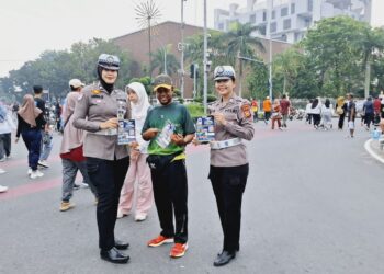 Tim Polwan Cantik Ditlantas Polda Riau Dapat Sambutan Hangat di Car Free Day Pekanbaru